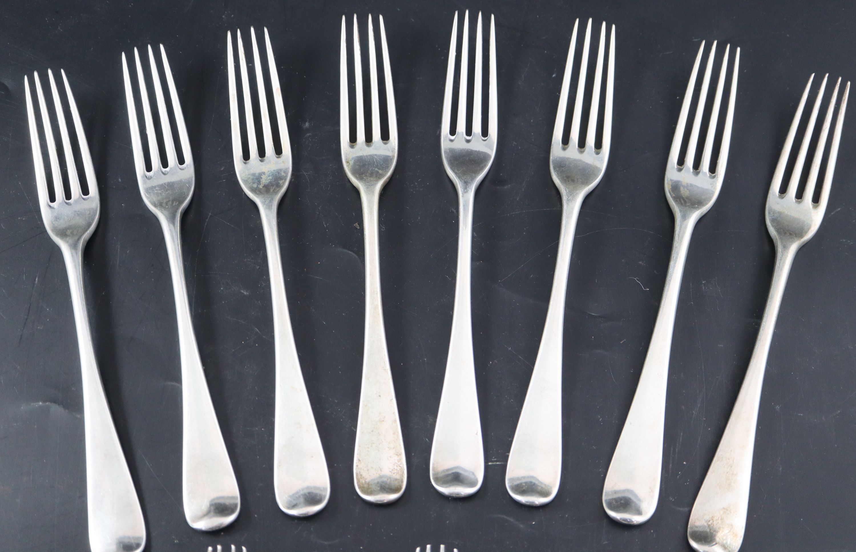 Eight Victorian silver Old English pattern table forks and eight matching entree forks